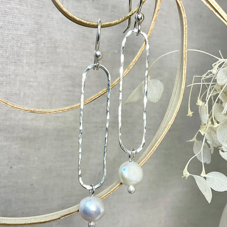 Pearl and Argentium silver earrings.