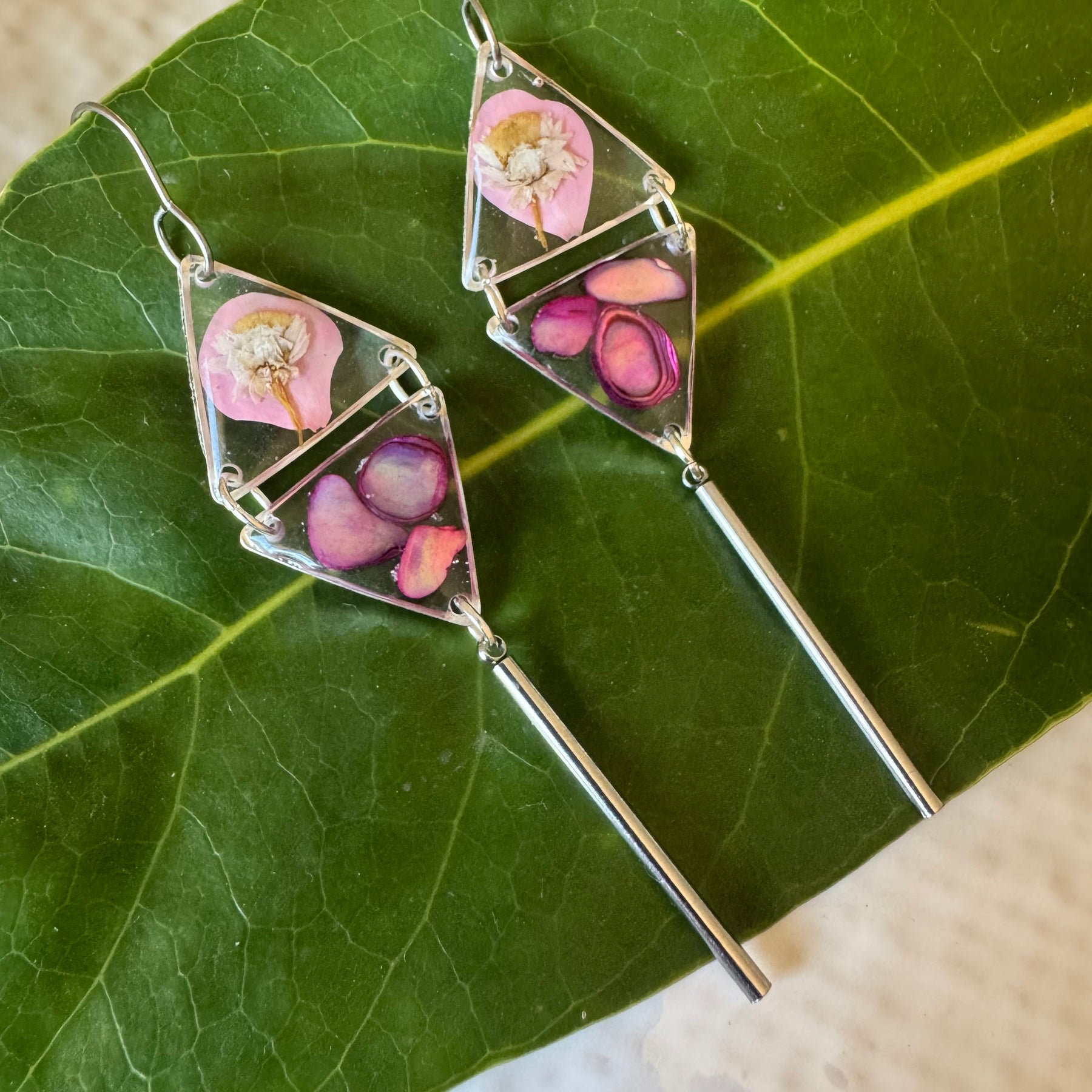 Double triangle cowrie shell and pressed flower resin earrings