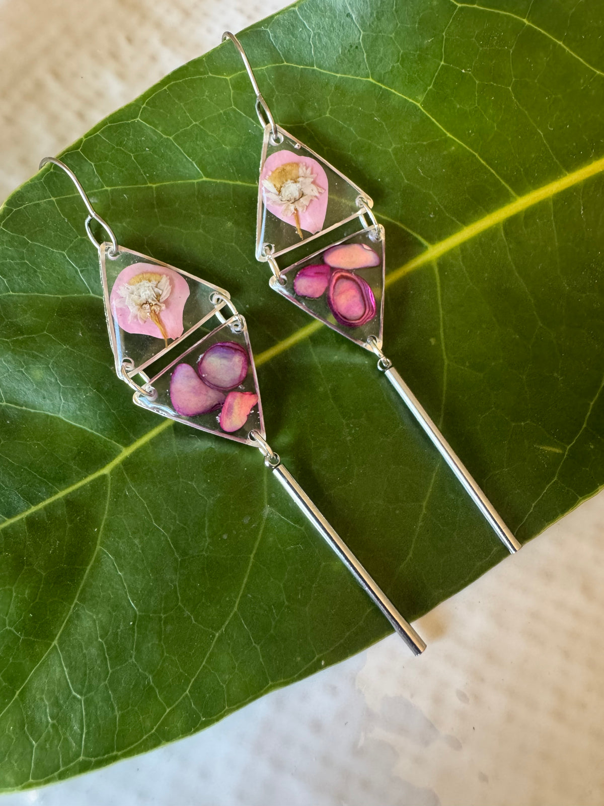 Double triangle cowrie shell and pressed flower resin earrings