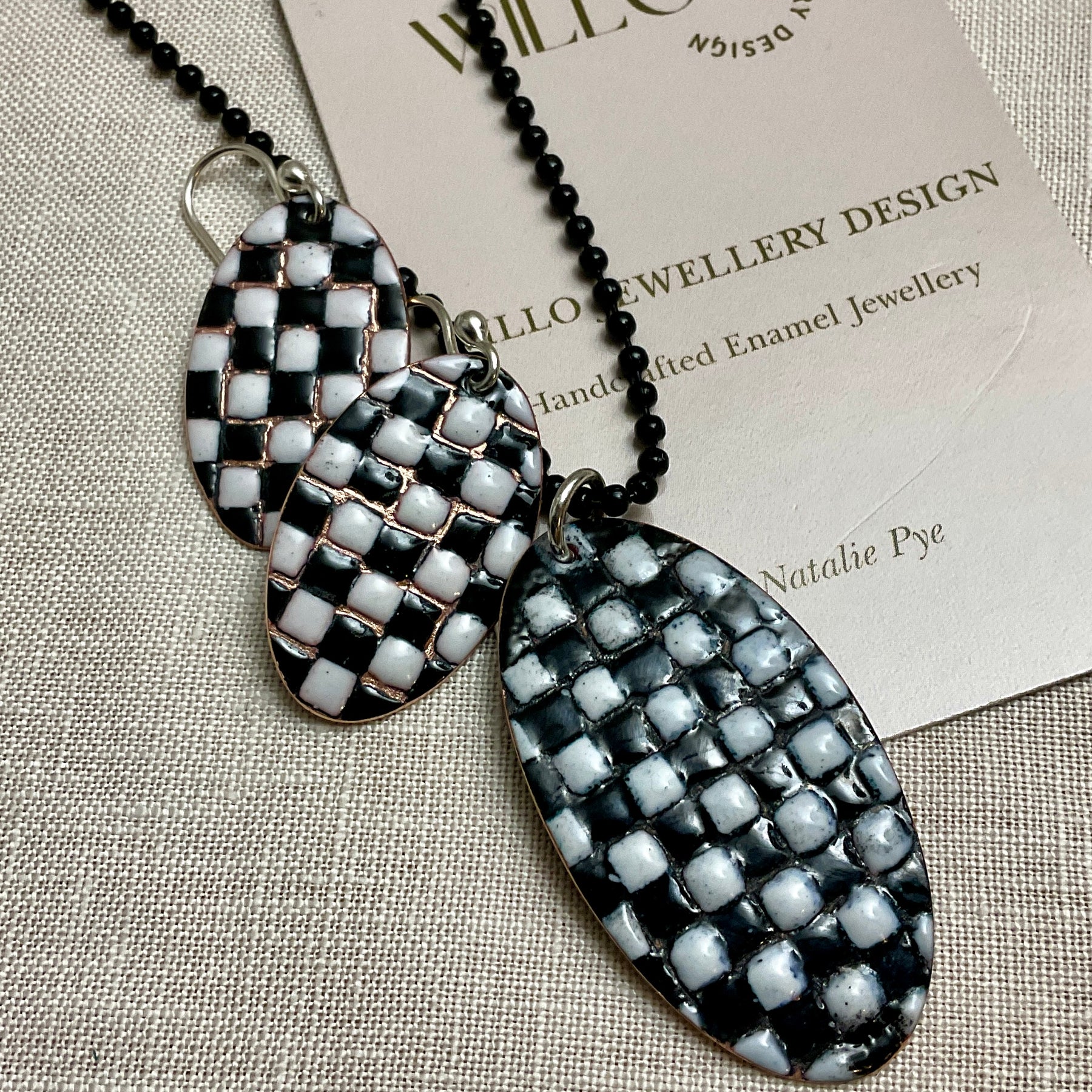 Black and white patchwork enamel pendant. Copper and enamel