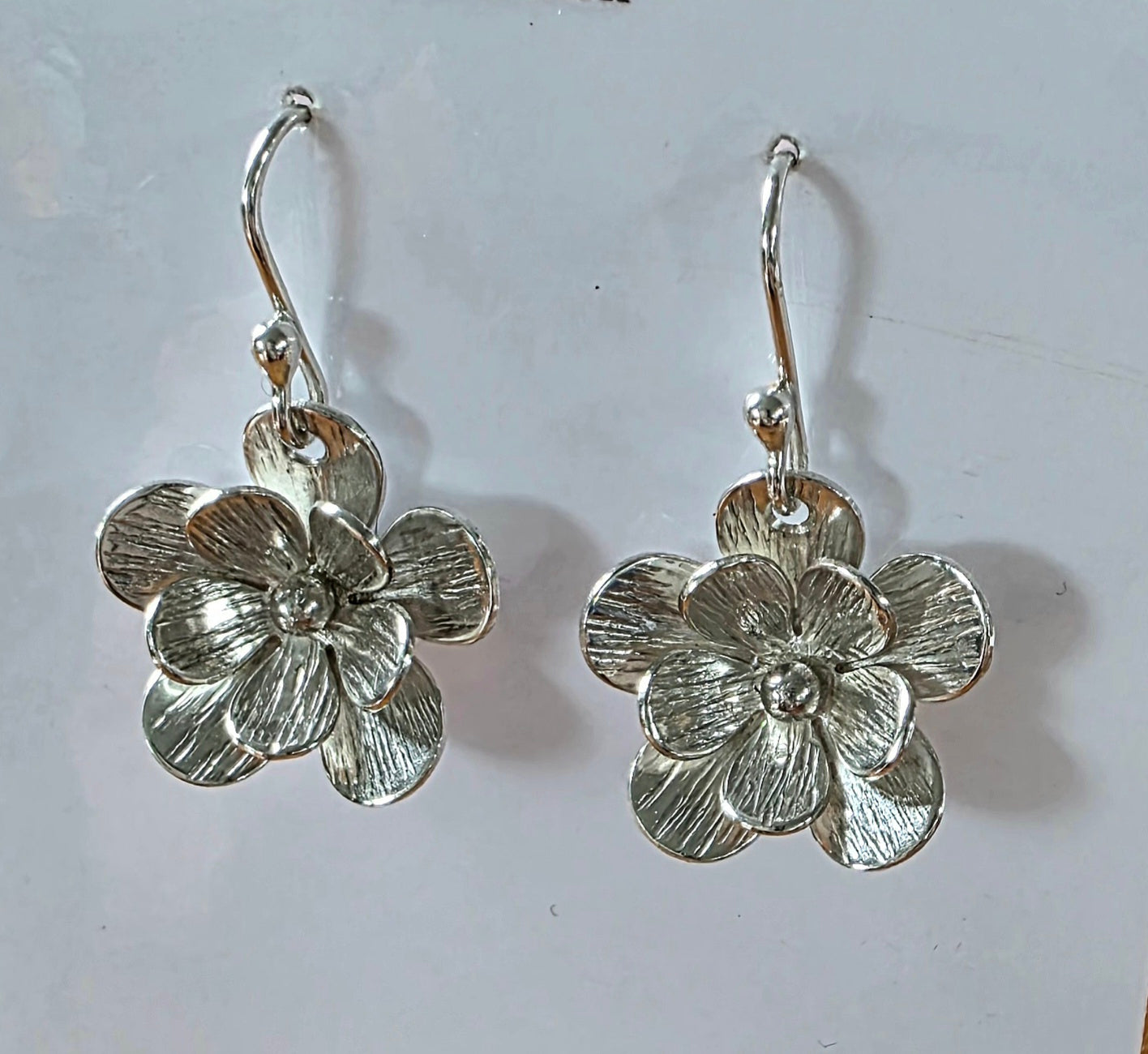 Dainty sterling silver textured flower earrings