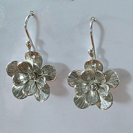 Dainty sterling silver textured flower earrings