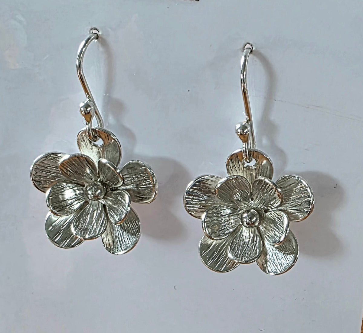 Dainty sterling silver textured flower earrings