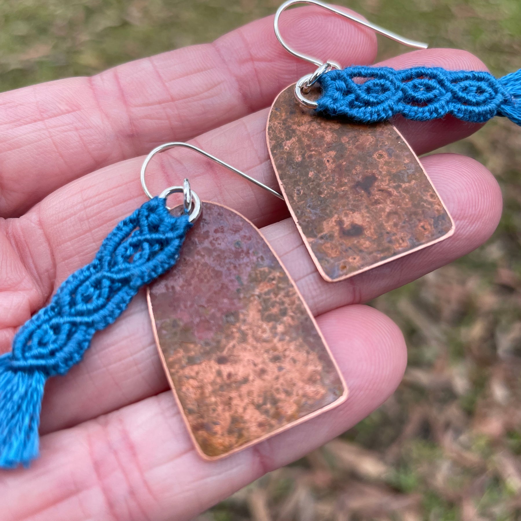 Blue macrame thread on patinated copper