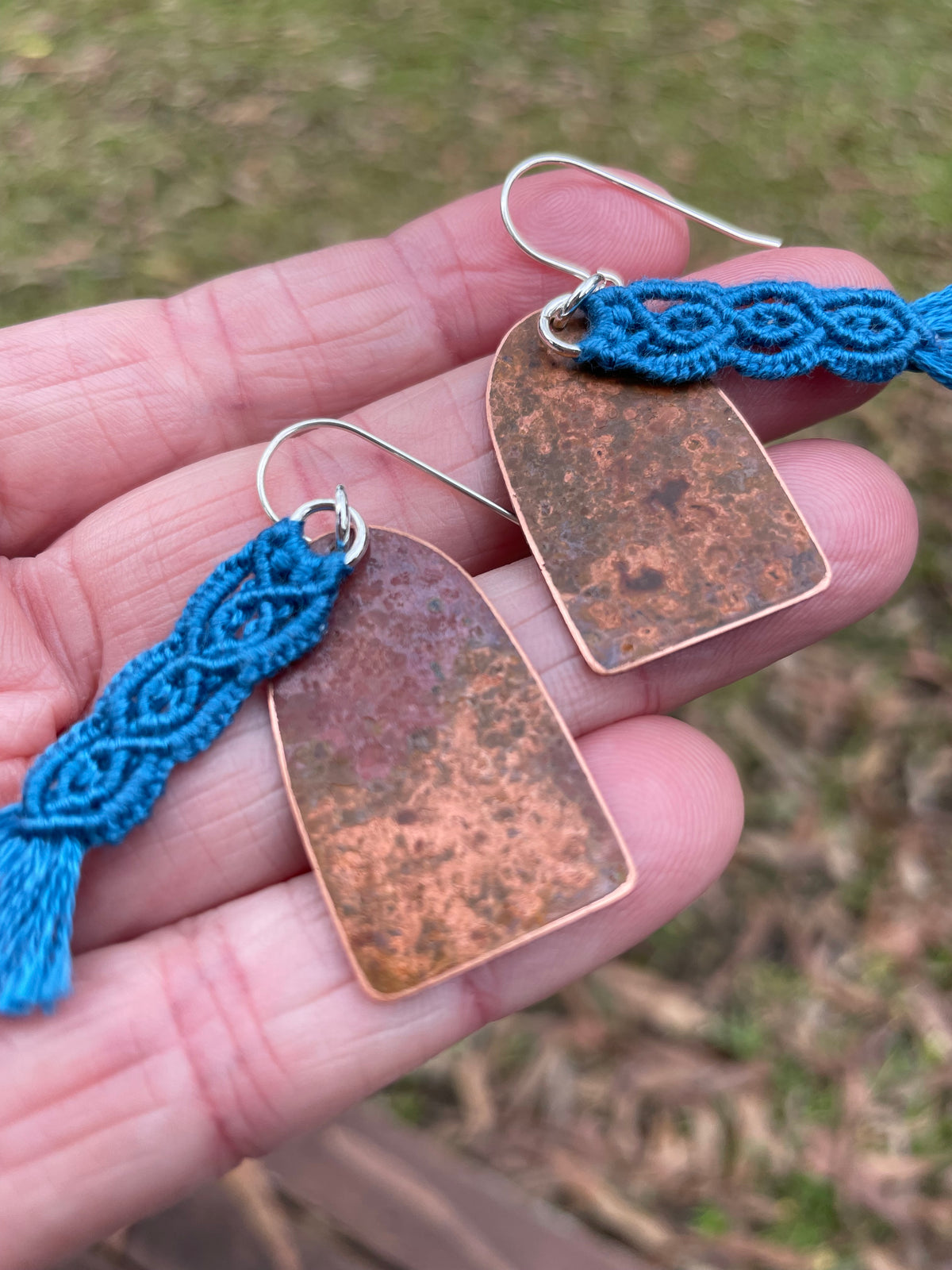 Blue macrame thread on patinated copper
