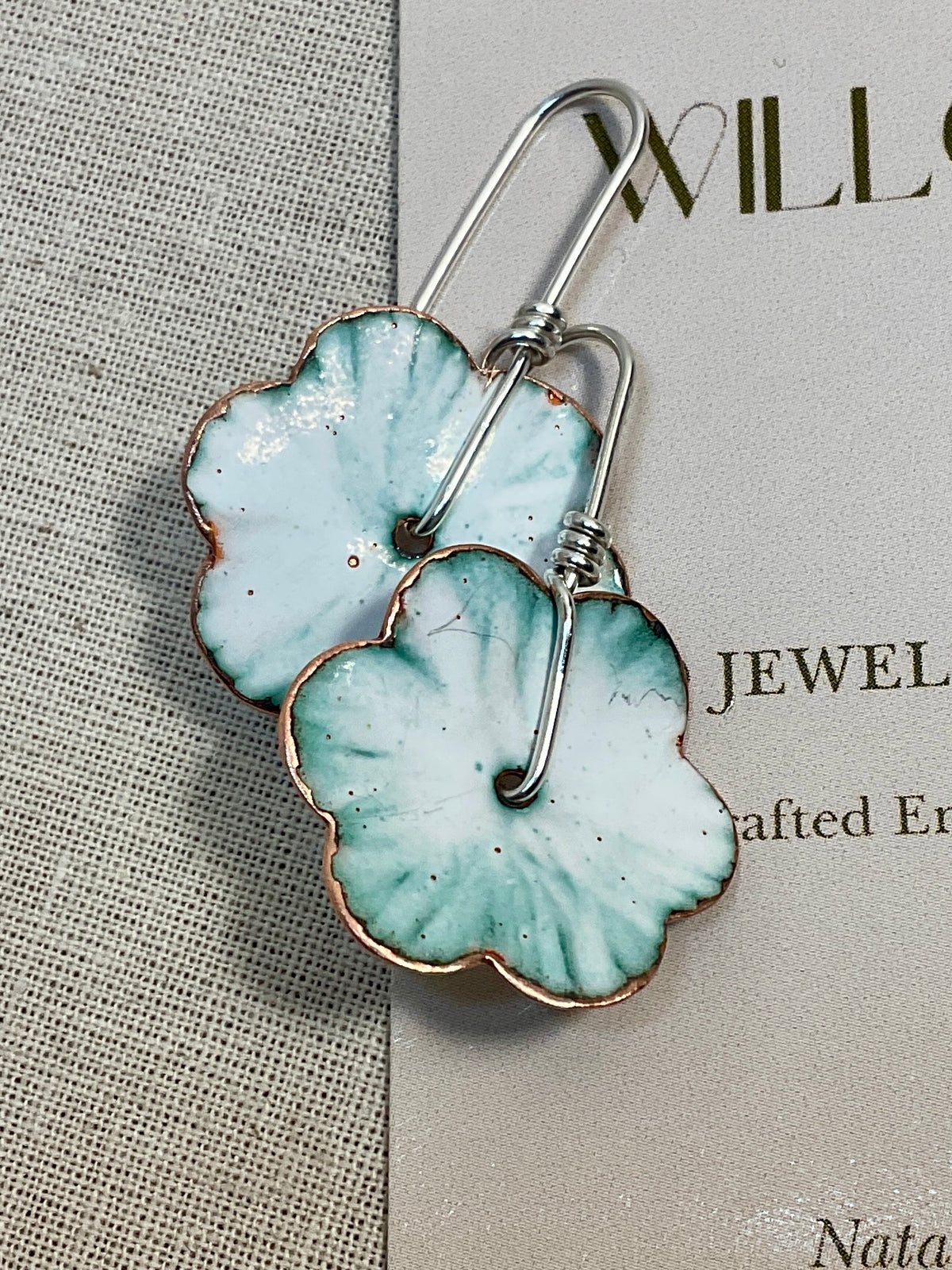 Teal and white flowers. Enamel earrings