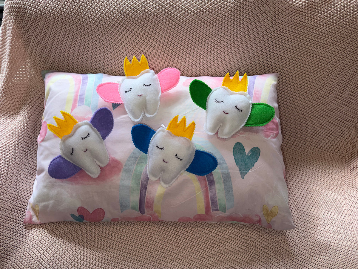 Tooth fairy snuggle toy with tooth pouch