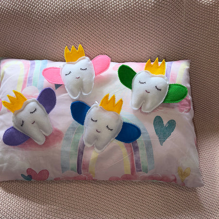 Tooth fairy snuggle toy with tooth pouch