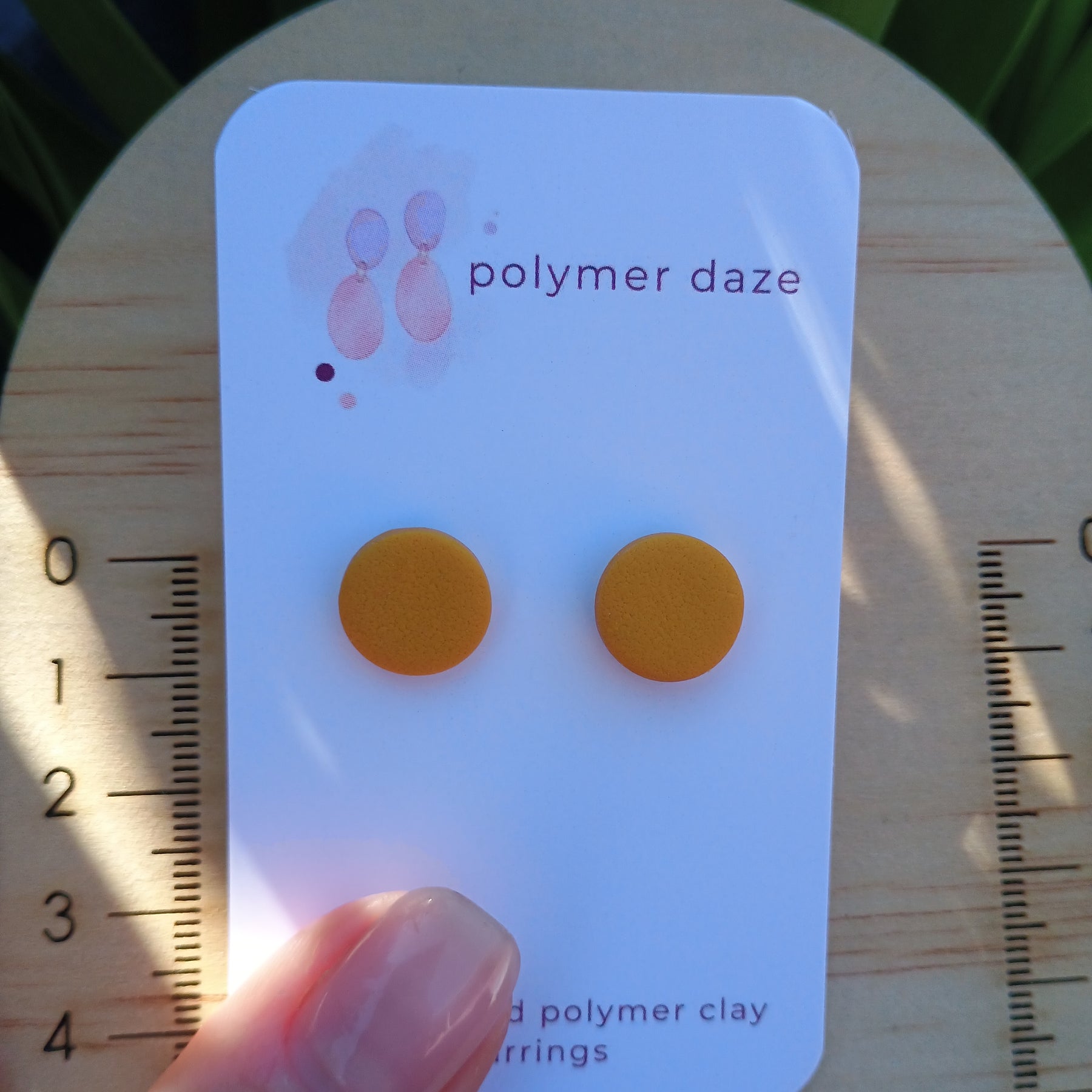 Mustard stud earring