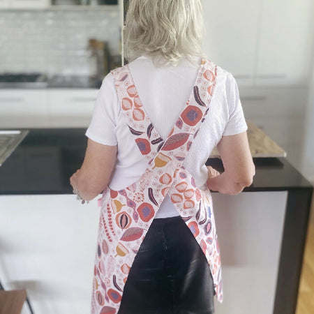 Pink seeds and flowers Japanese style cross back kitchen apron. Crafting, gardening, no ties apron.