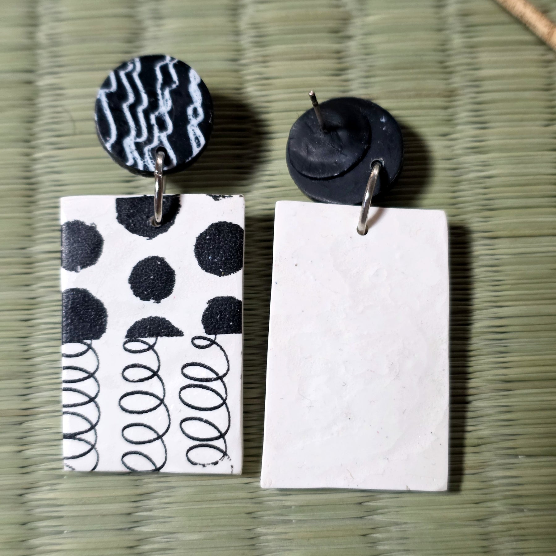 Black and white stud earrings