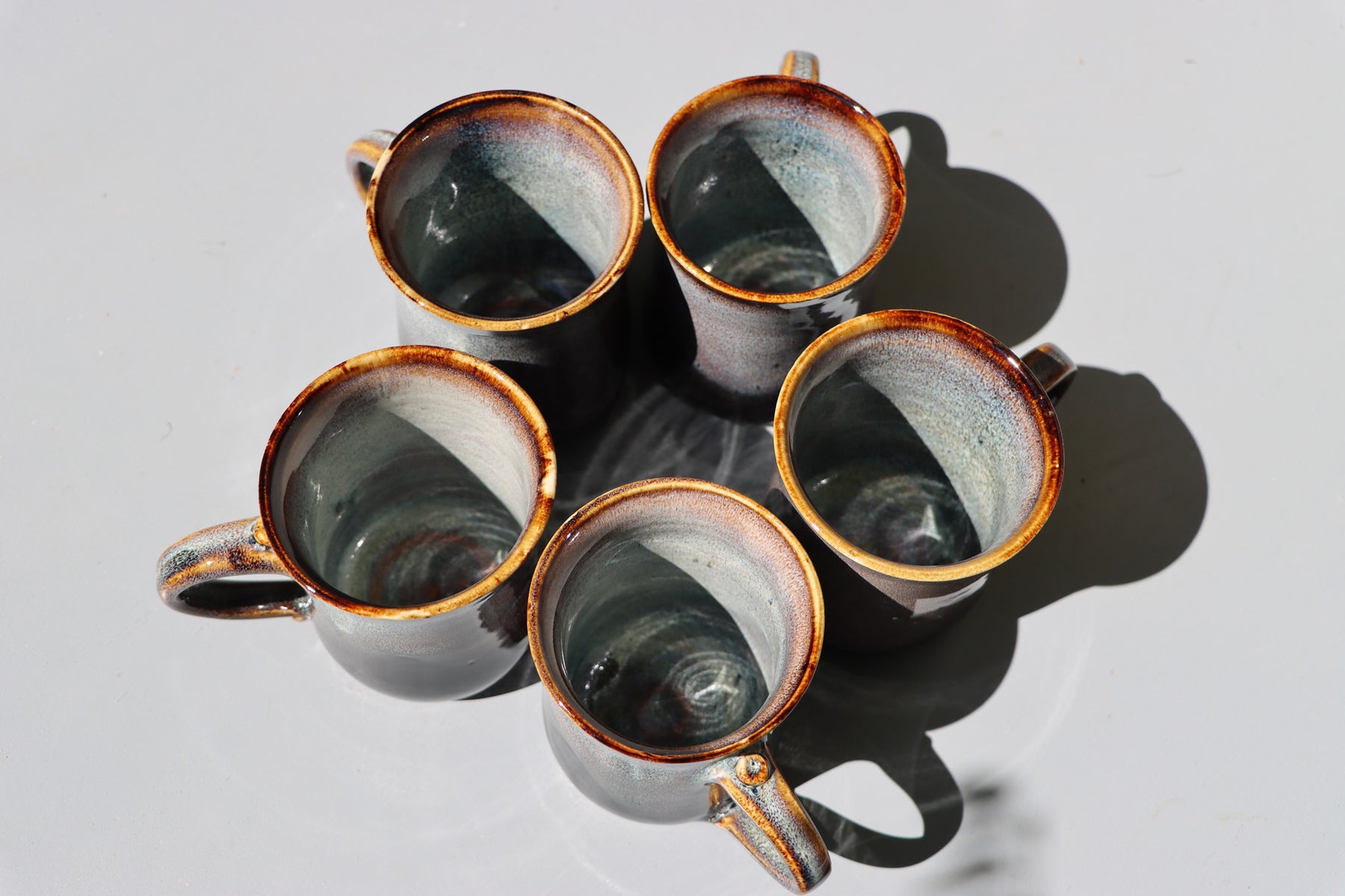 Large hand made mugs in speckled brown and white