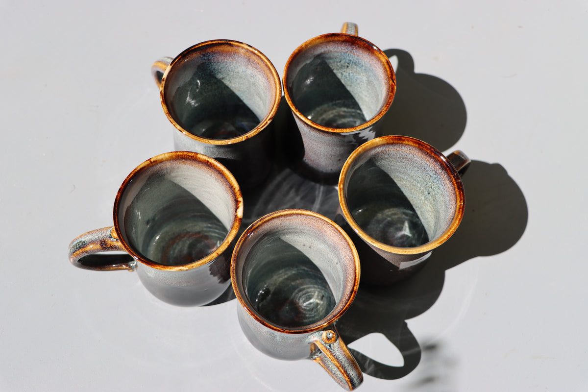 Large hand made mugs in speckled brown and white