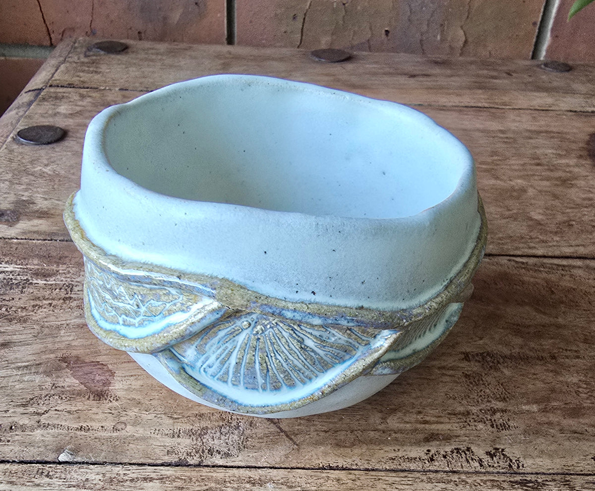 White carved bowl
