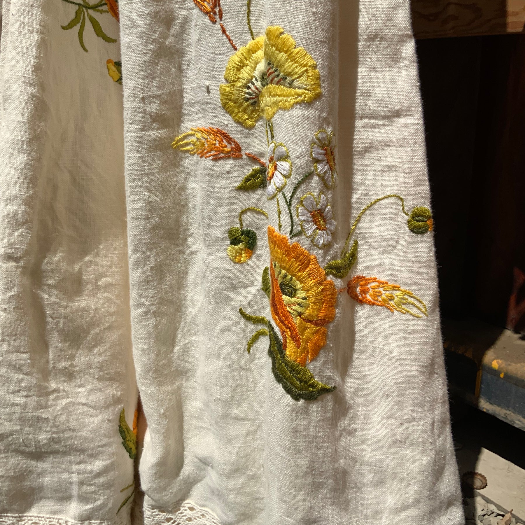 Upcycled embroidered linen tablecloth into "Flower Power" Bell Bottoms