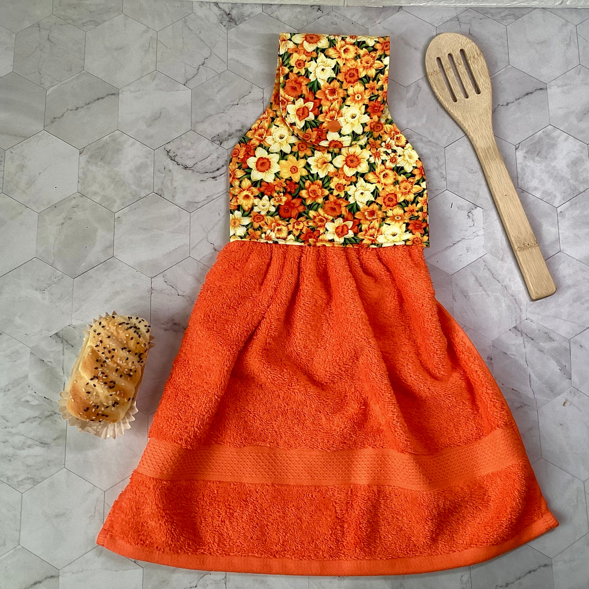 Daffodils (orange) hanging hand towel.