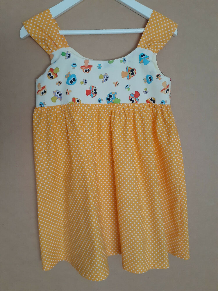 Cute child's dresses sizes 1-6. One-Of-A-Kind Print Bodice with Contrasting Spotty Skirt & Straps.