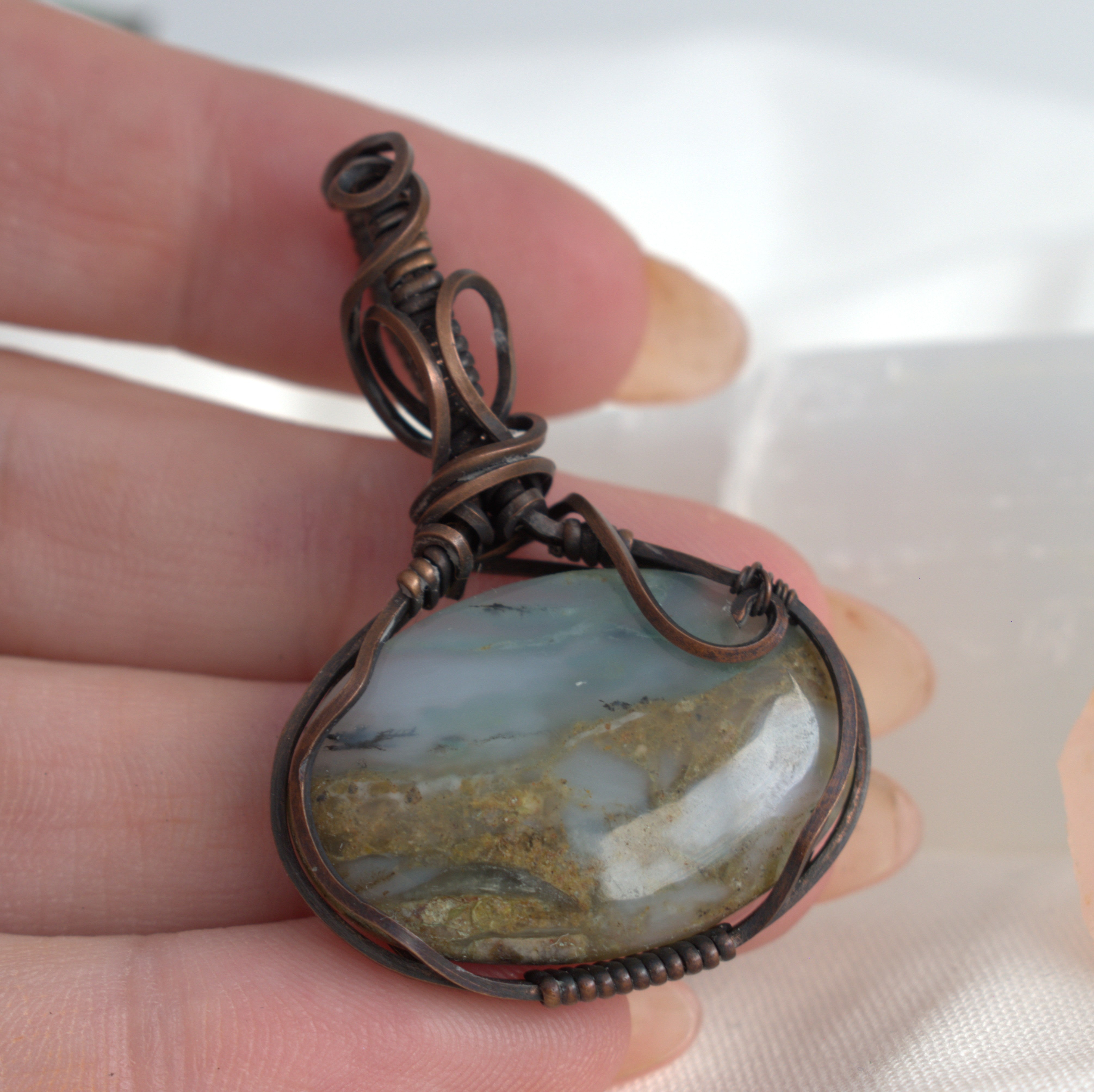 Hand-wrapped Peruvian Opal Copper Pendant