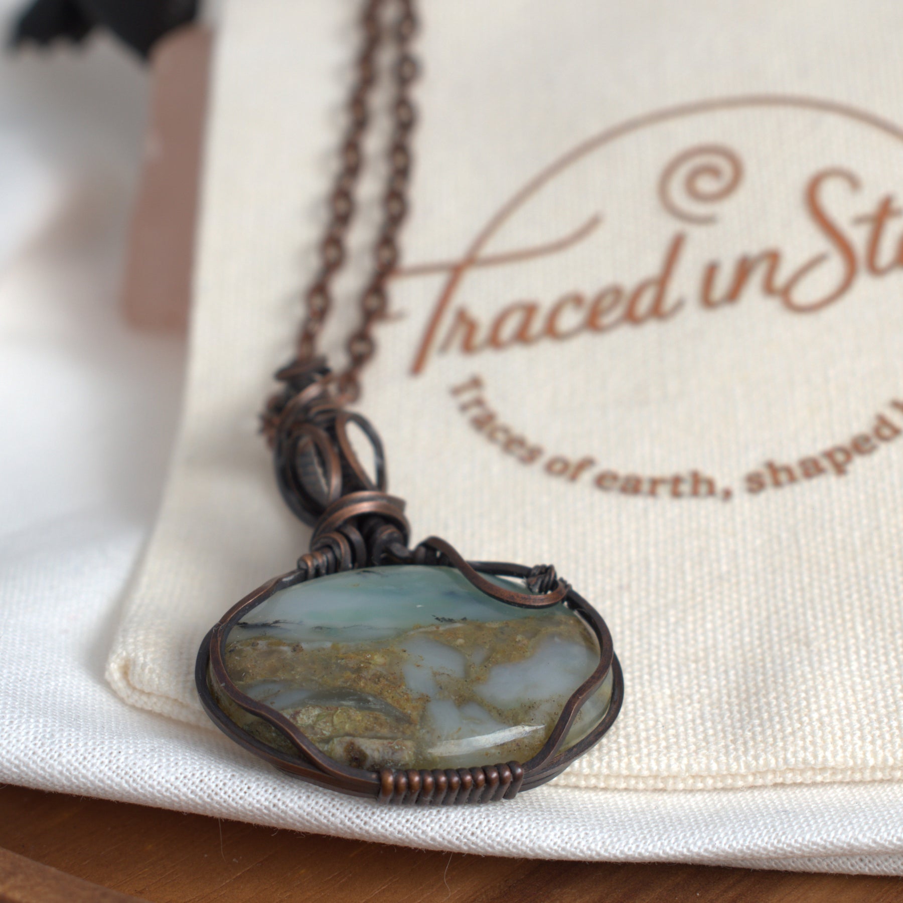 Hand-wrapped Peruvian Opal Copper Pendant