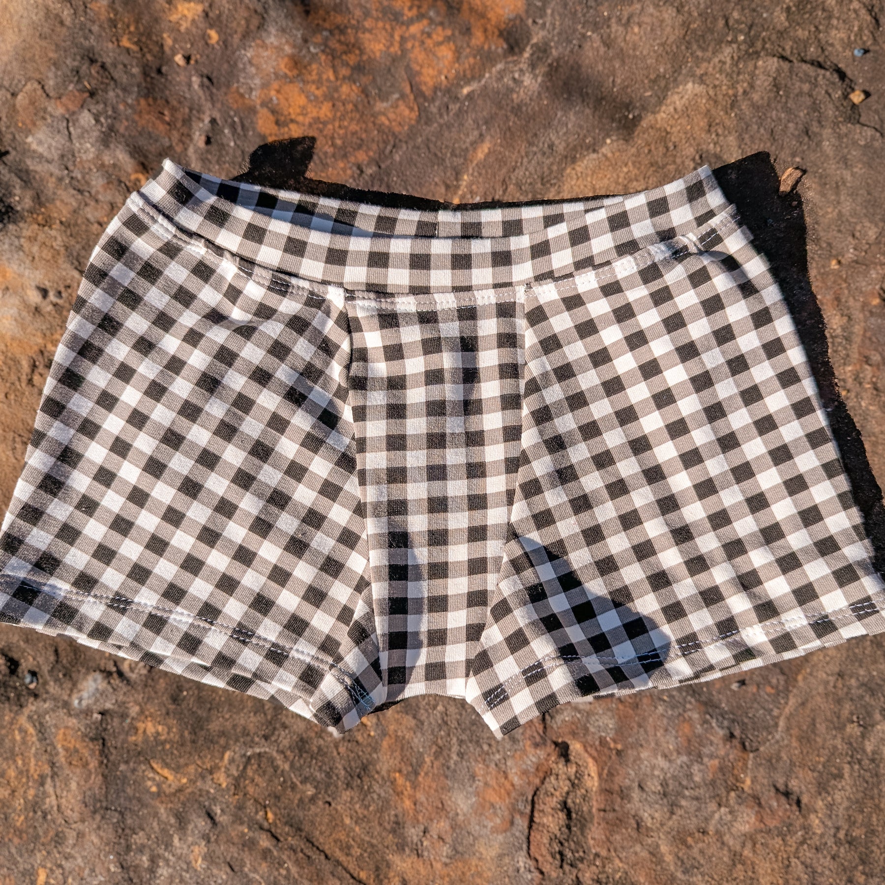 Black gingham checked organic trunk underpants for kids sizes 1 to 12 boys