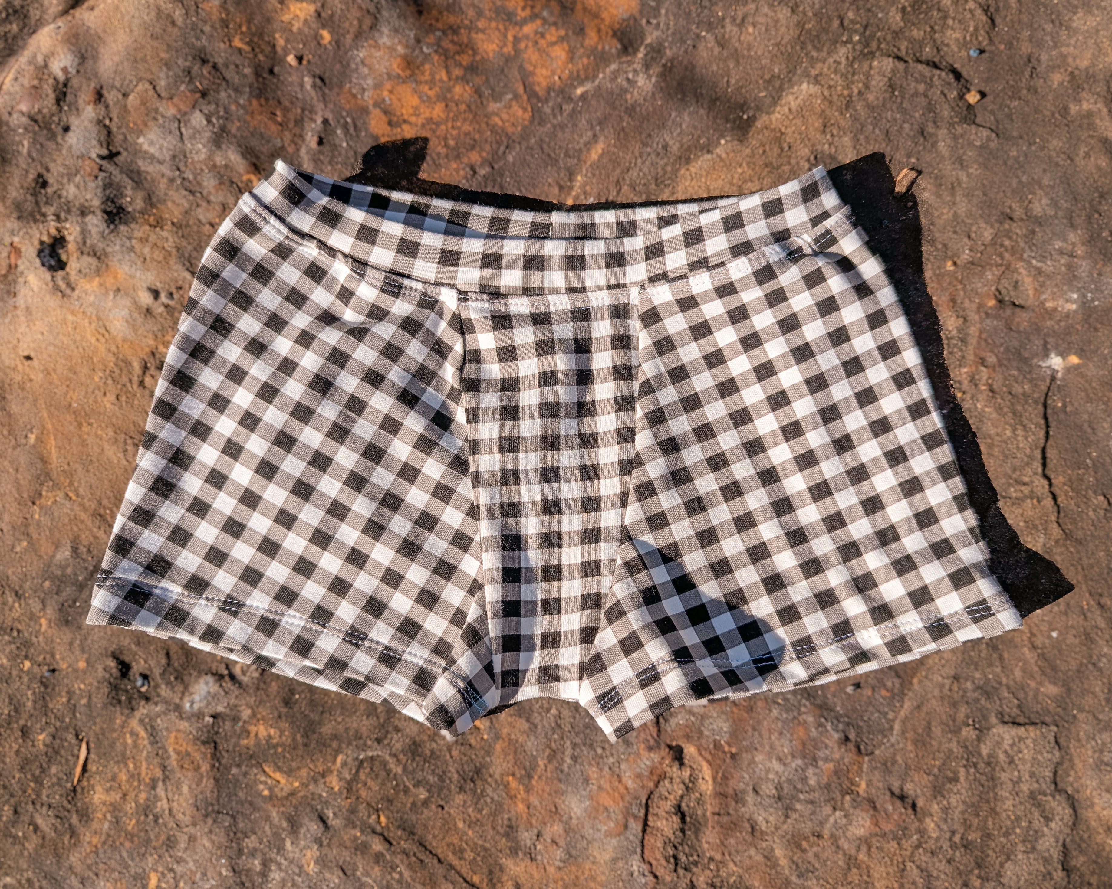 Black gingham checked organic trunk underpants for kids sizes 1 to 12 boys