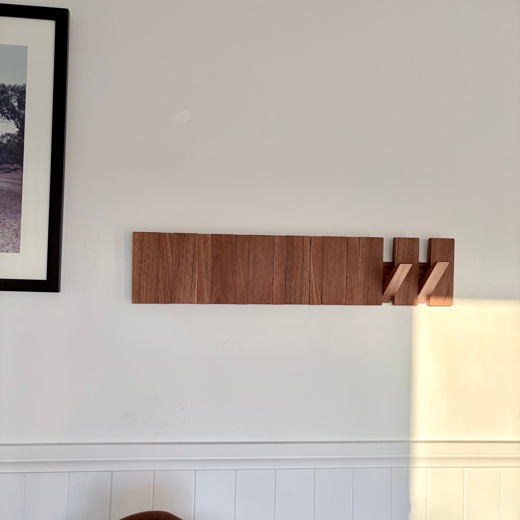 Grey box piano style coat rack