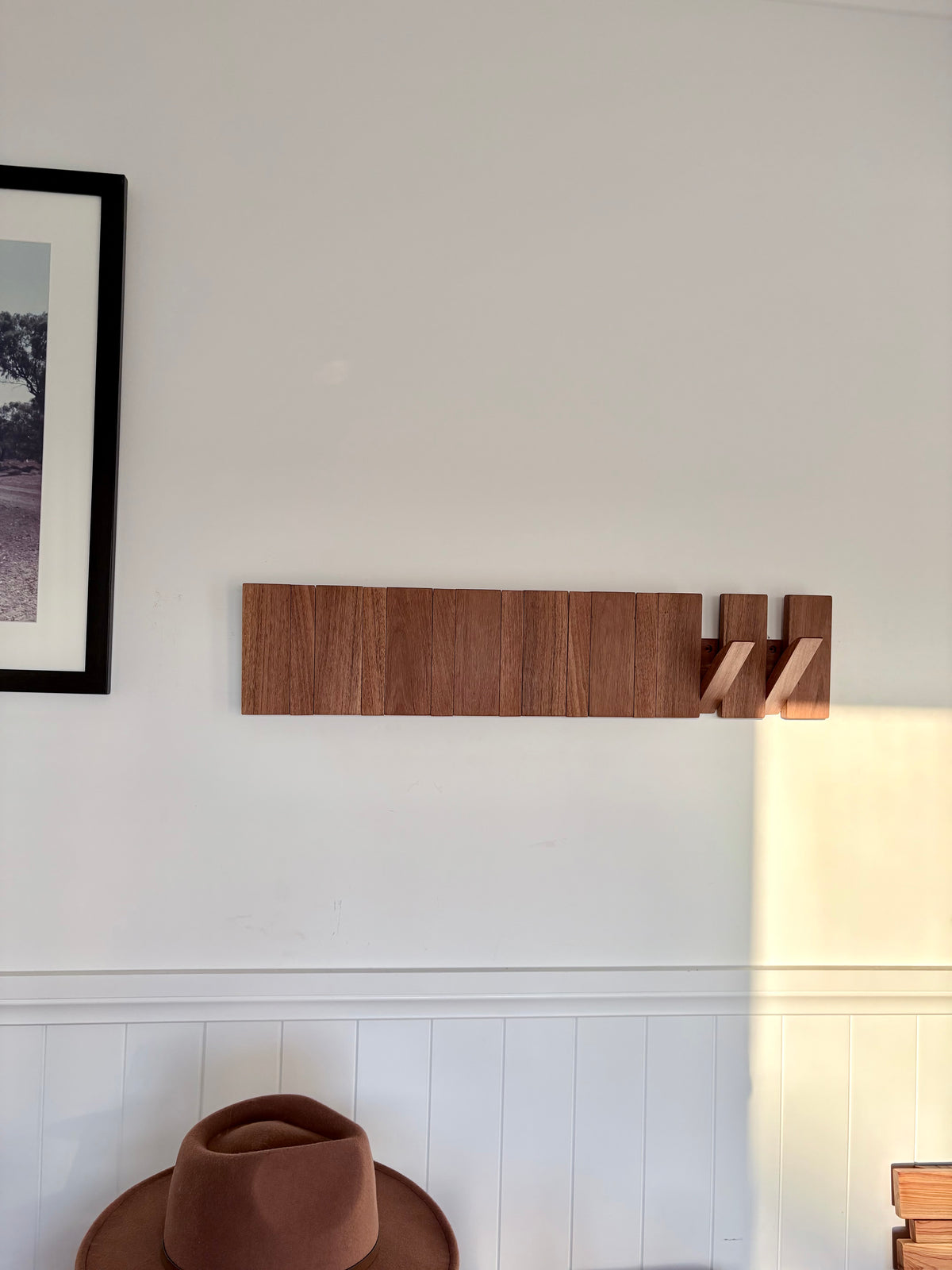Grey box piano style coat rack