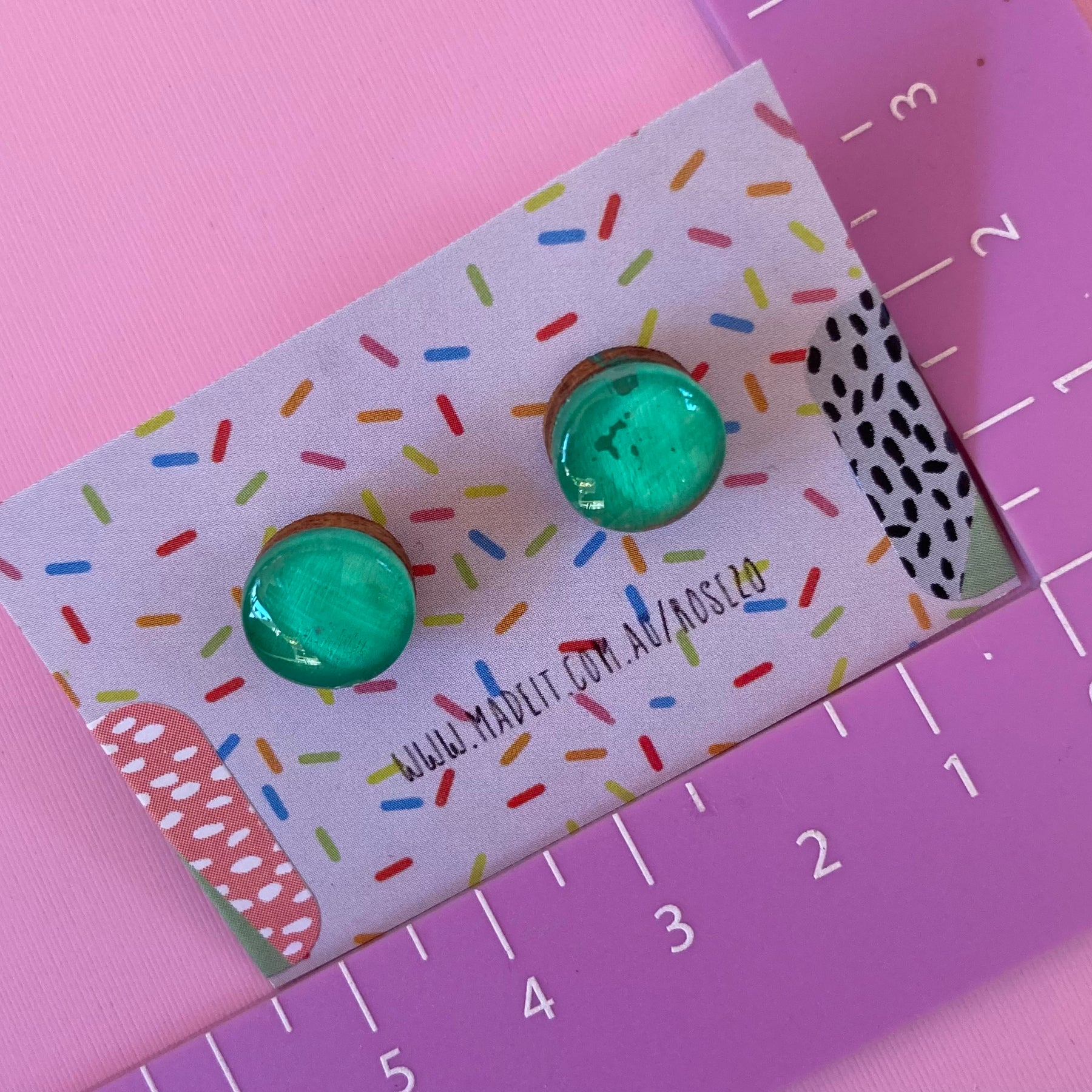 Green glass domed studs