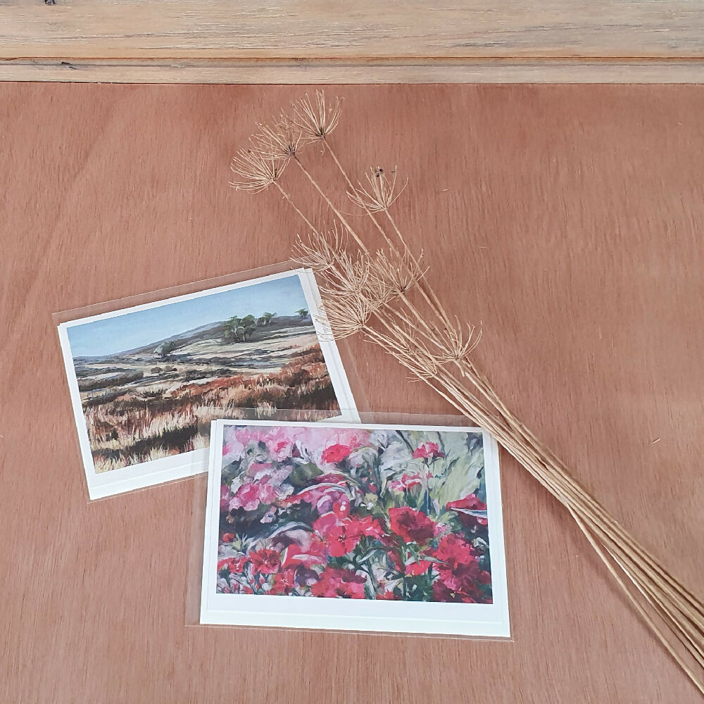 Images of paintings: Travelling home (left), Celebrating Spring (Right)