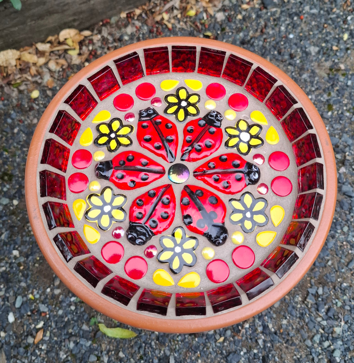 Mosaic Dish with a bright Red Lady Bugs