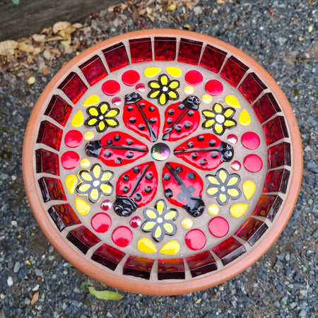 Mosaic Dish with a bright Red Lady Bugs
