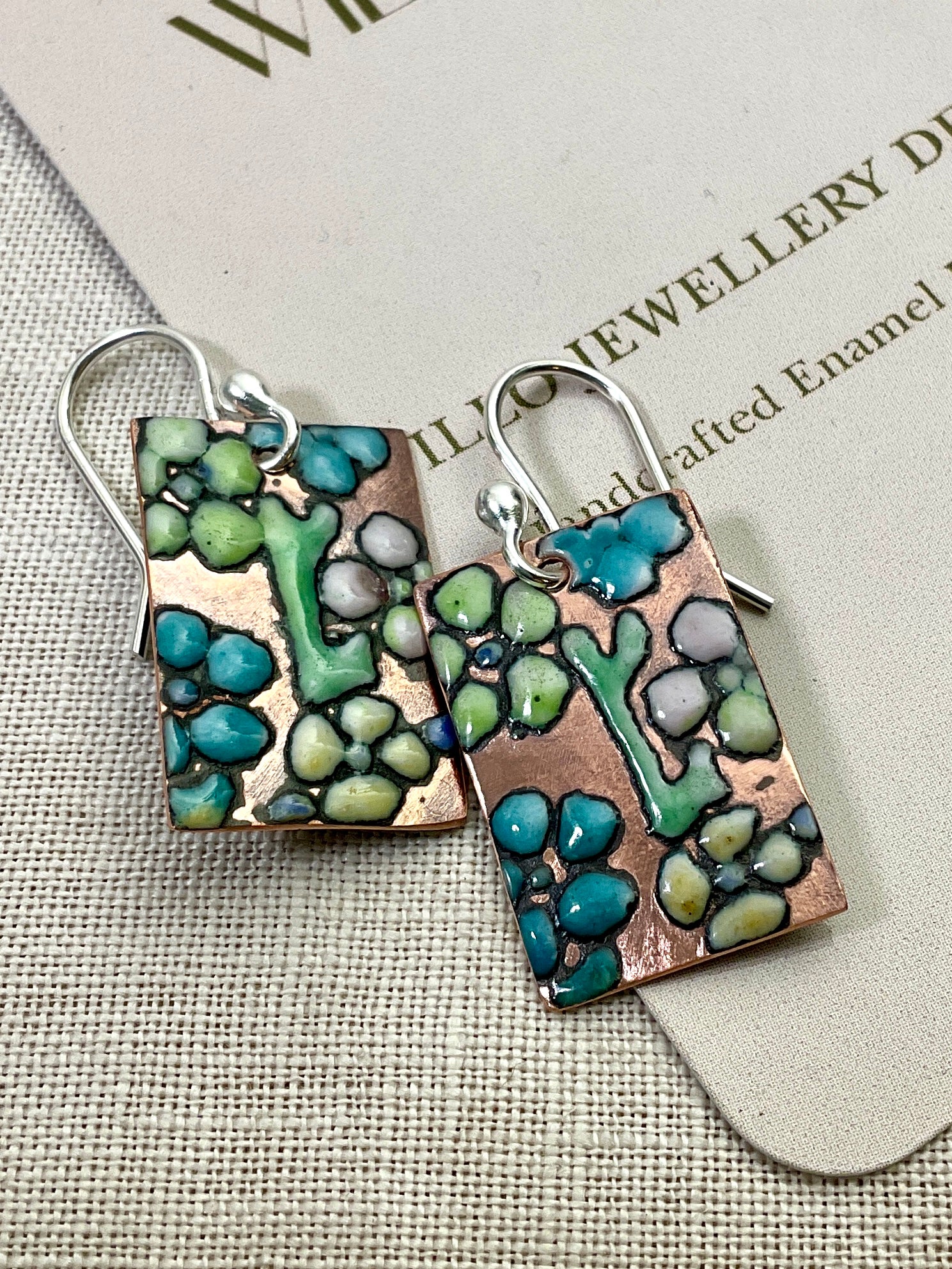 Flowers. Embossed enamel earrings. Handmade