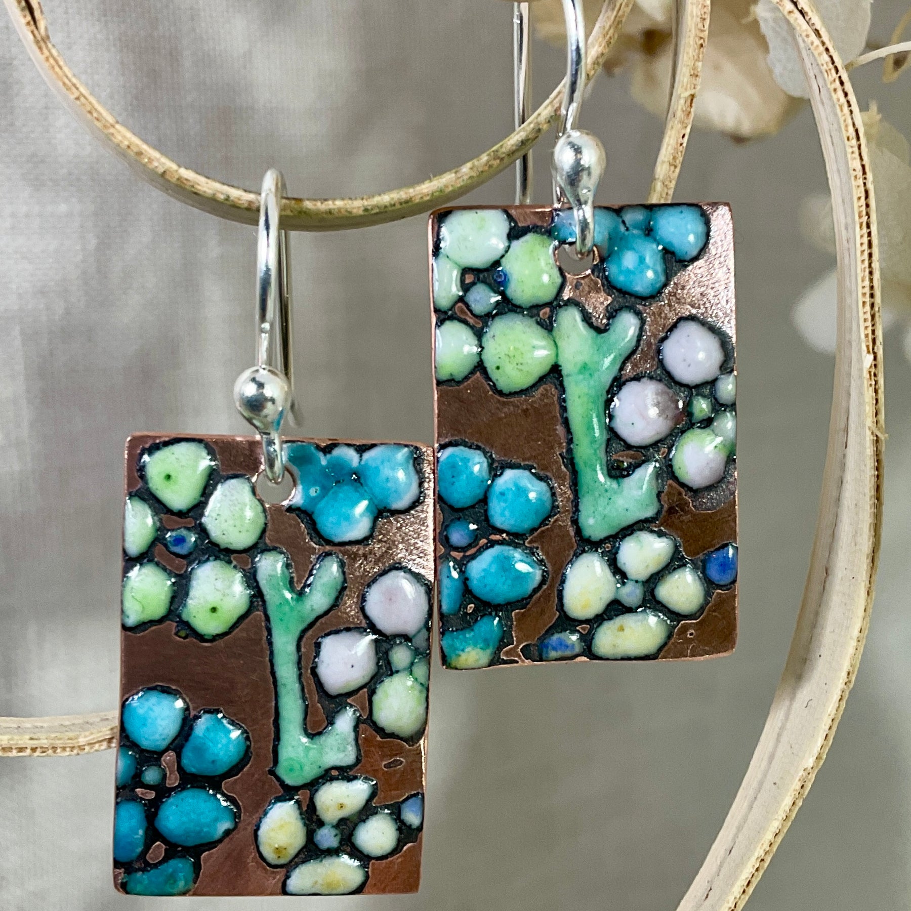 Flowers. Embossed enamel earrings. Handmade