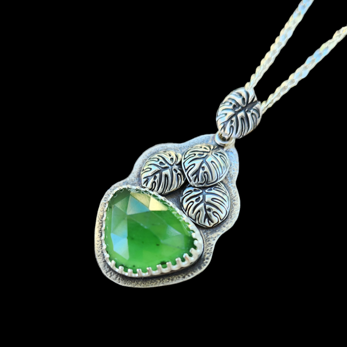 Verdant monstera pendant with serpentine