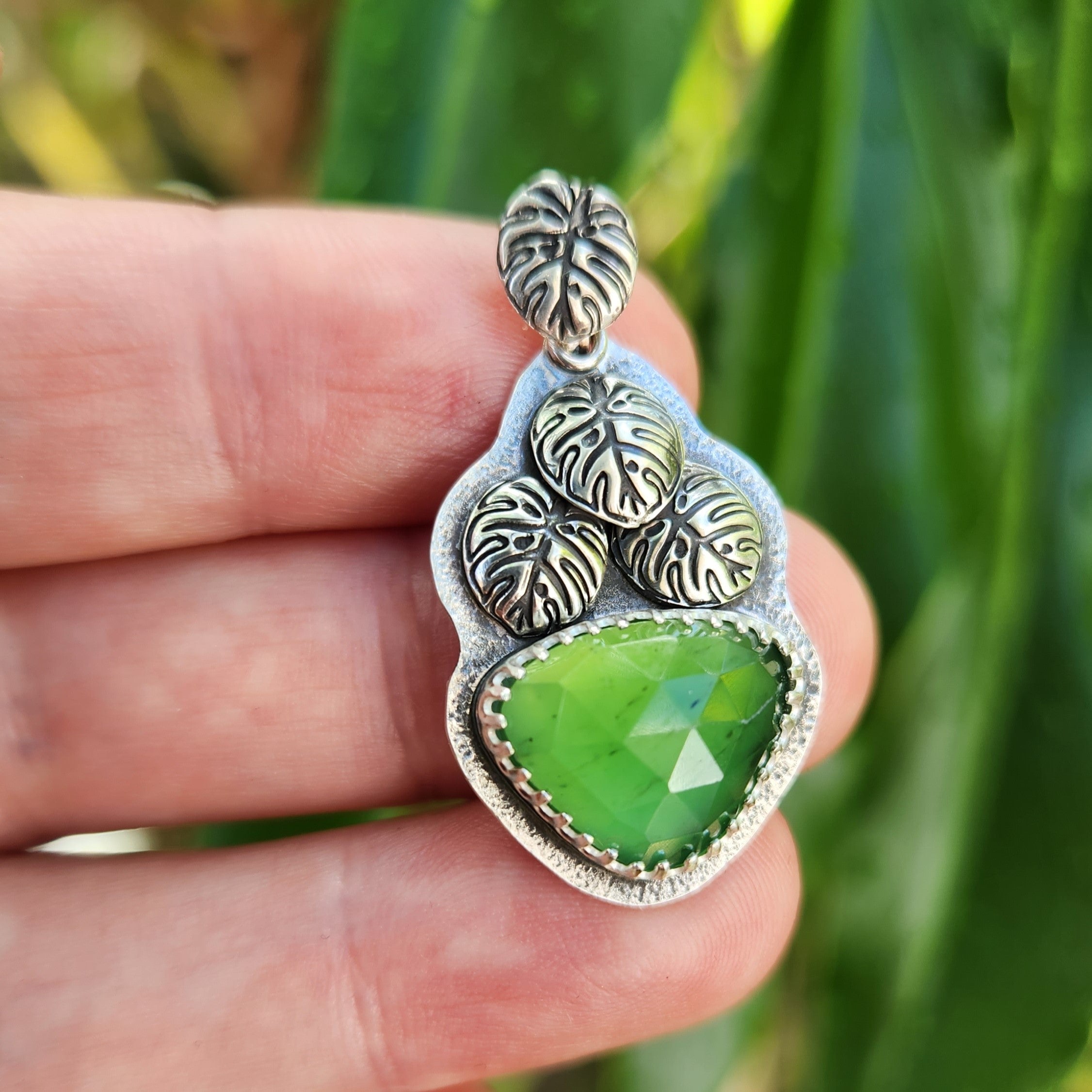 Verdant monstera pendant with serpentine