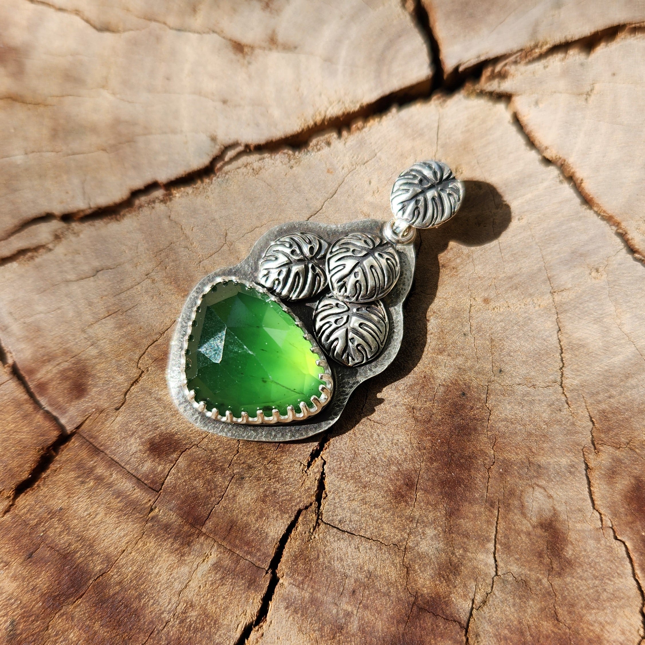 Verdant monstera pendant with serpentine