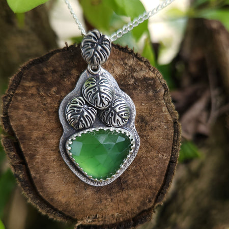 Verdant monstera pendant with serpentine