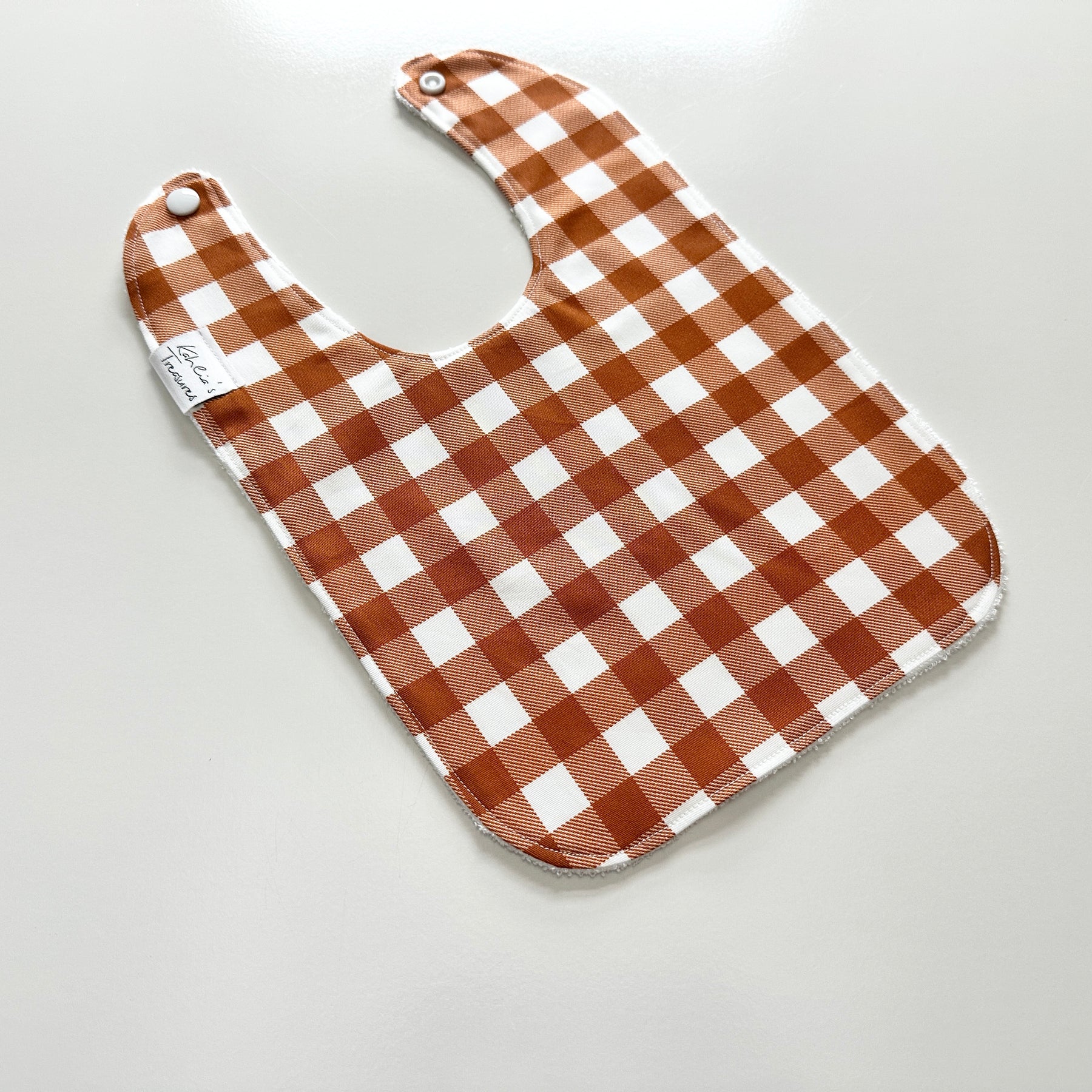Rust gingham bib