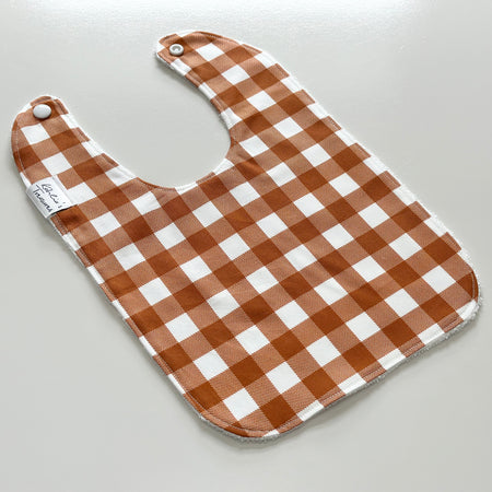 Rust gingham bib
