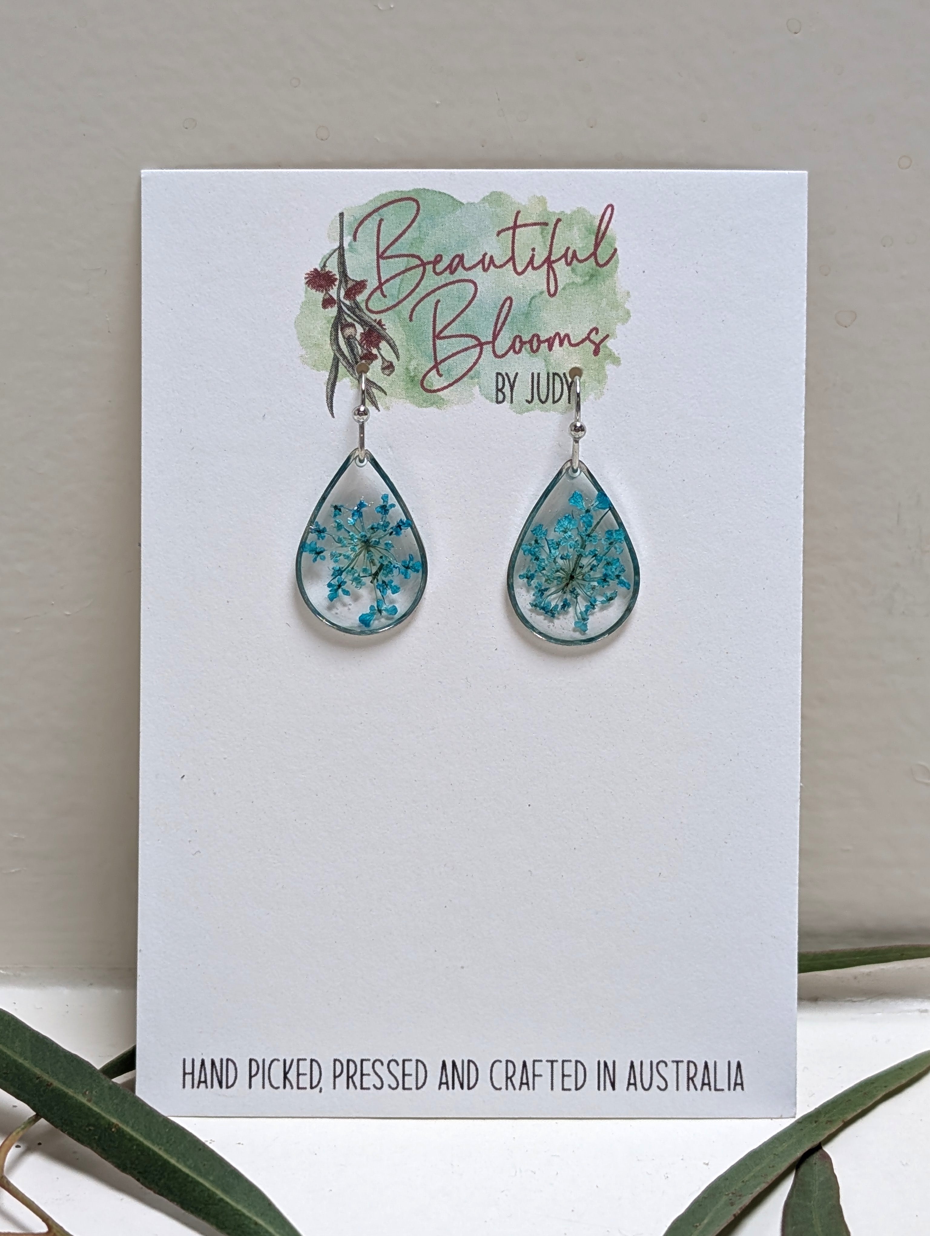 Teardrop silver earrings with teal Queen Anne's Lace