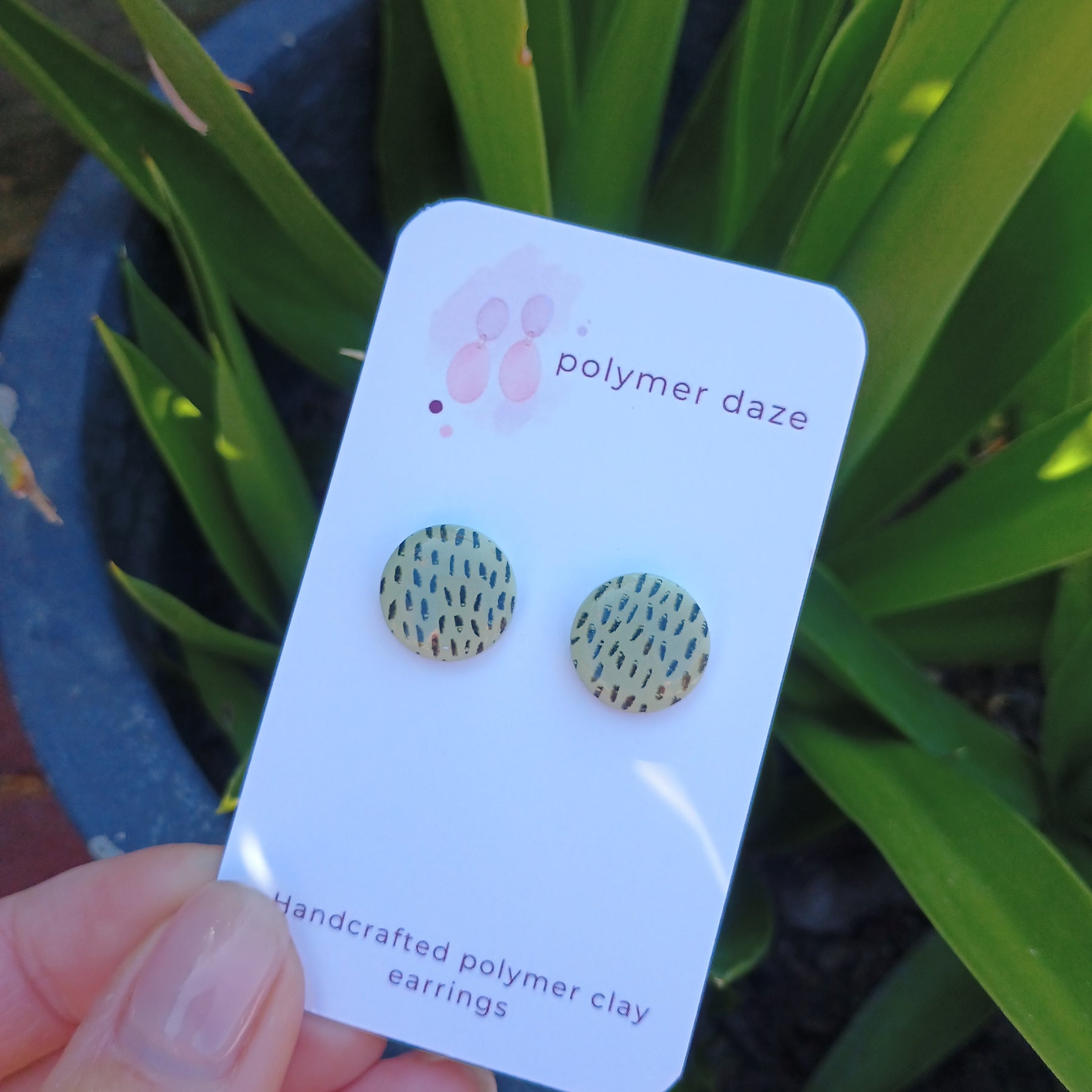 Glow in the dark painted stud earrings
