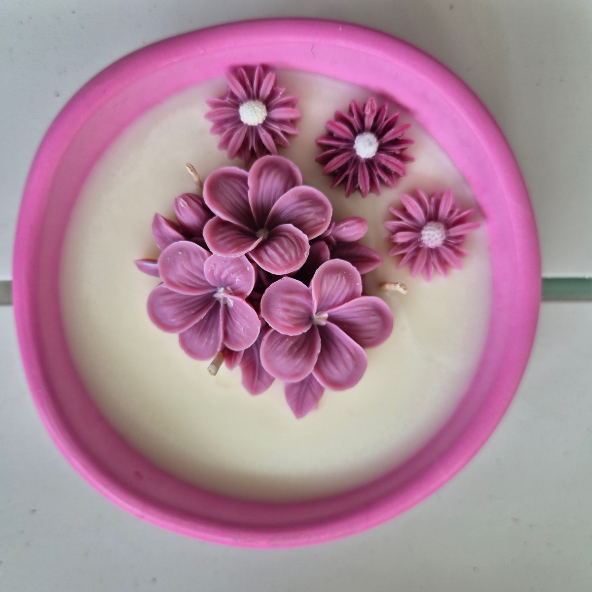 Concrete organic shaped bowl candle with black raspberry lime fragrance