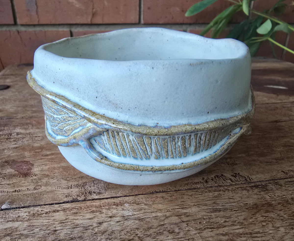 White carved bowl