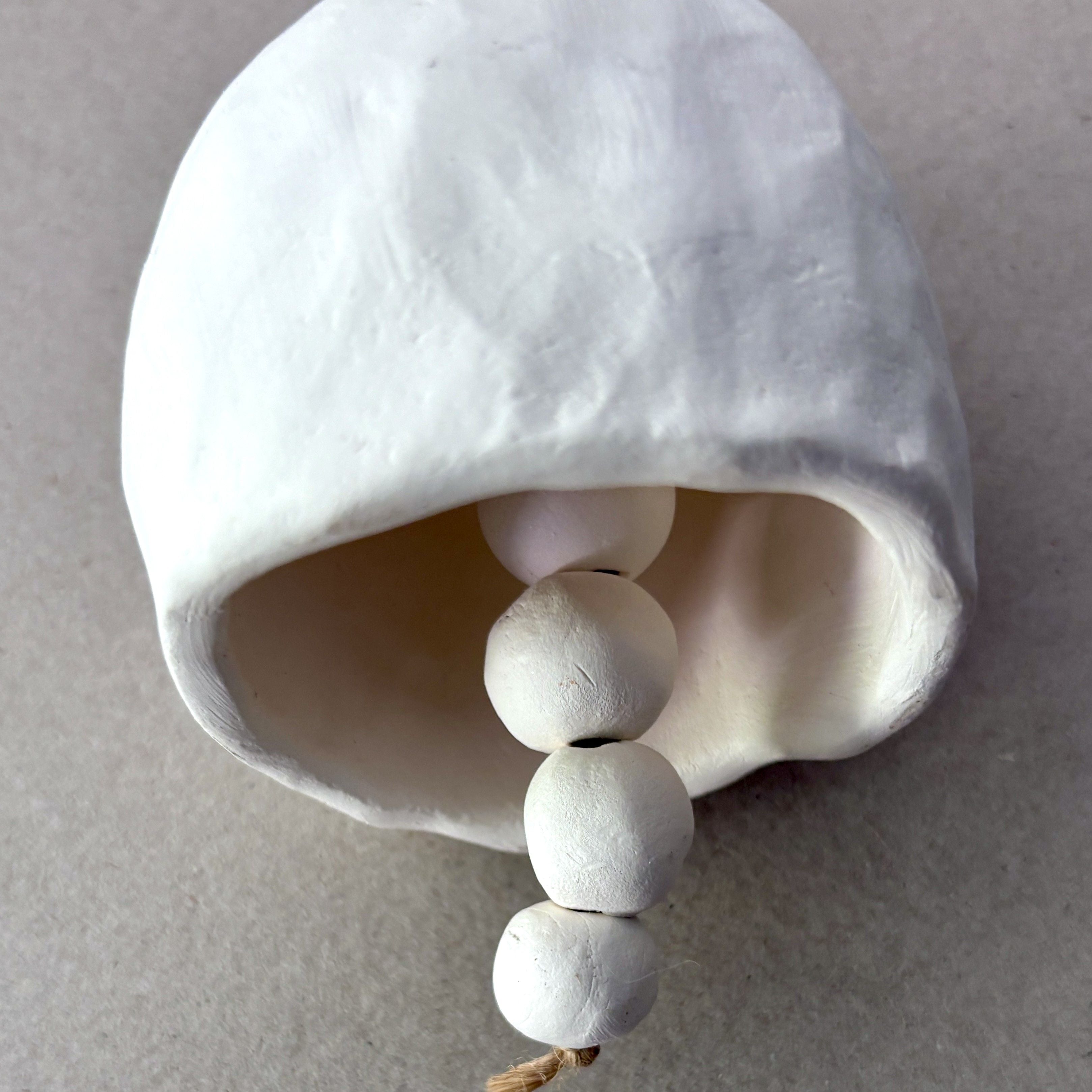 Handmade White Clay Bell on jute string (26-14)