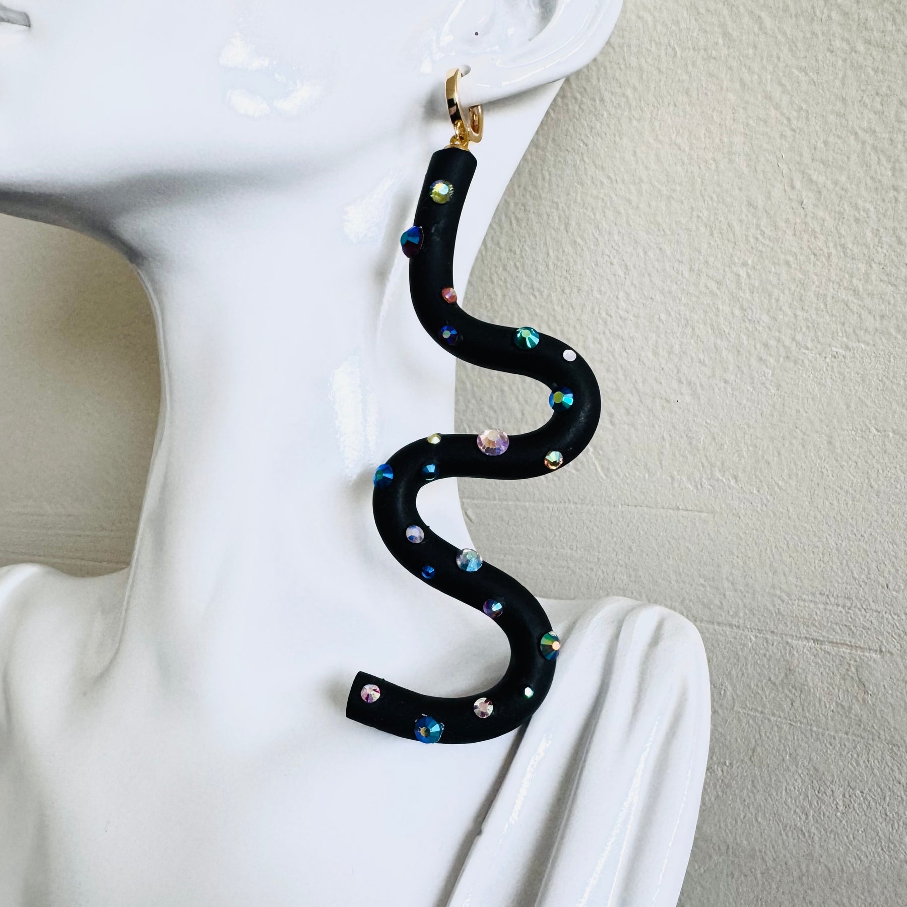Black squiggle polymer clay earrings with holographic gems