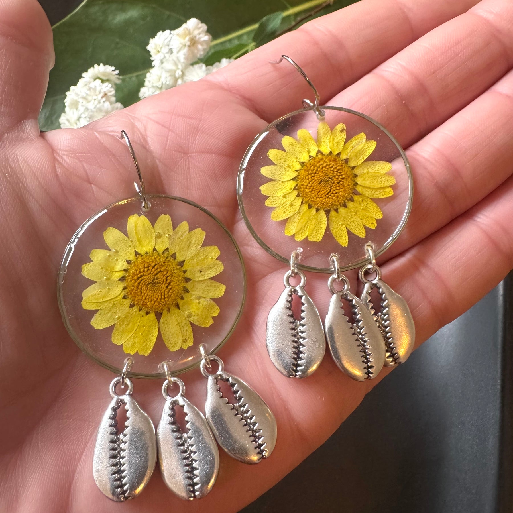 Yellow daisy and shell resin earrings