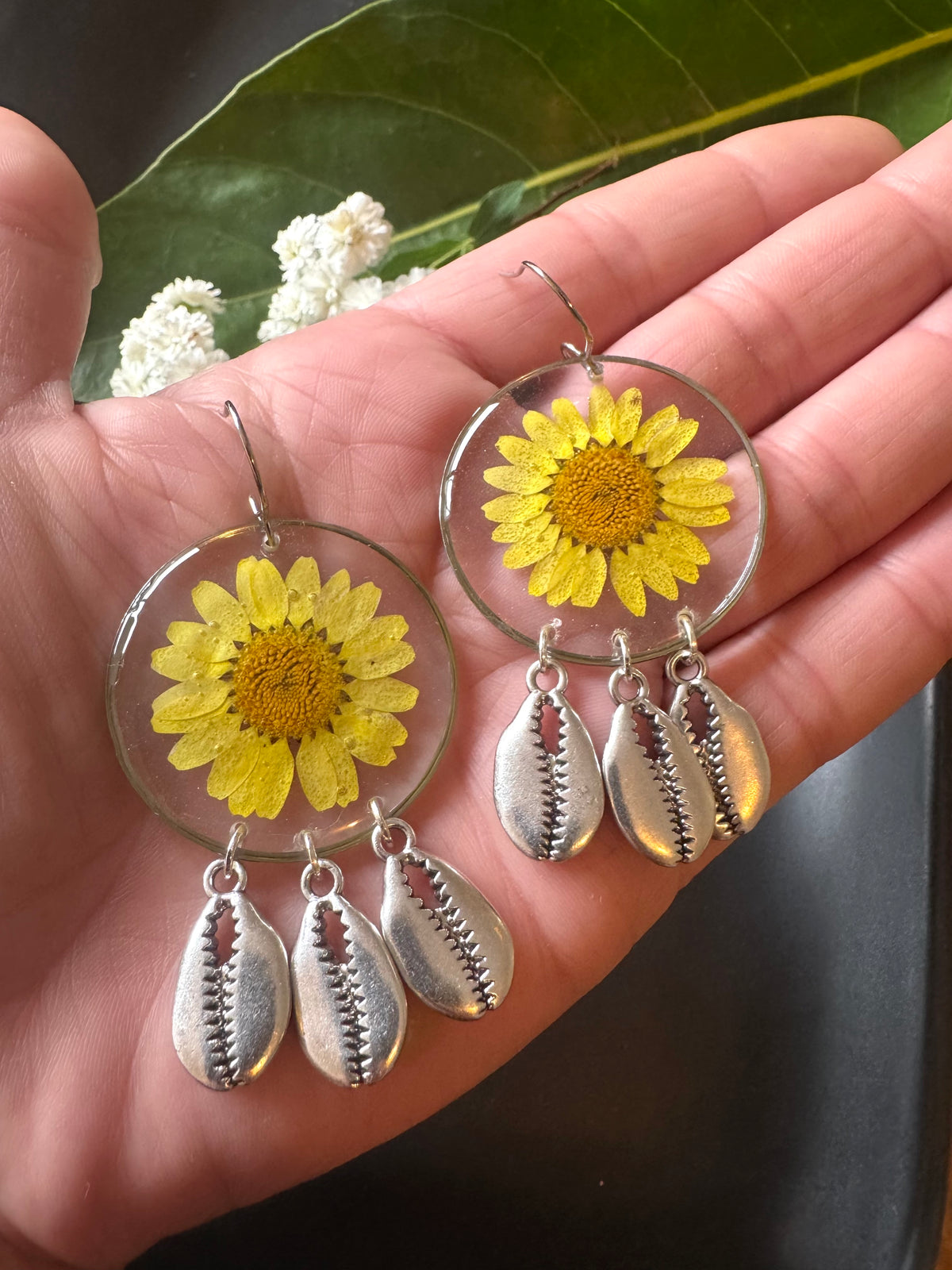 Yellow daisy and shell resin earrings