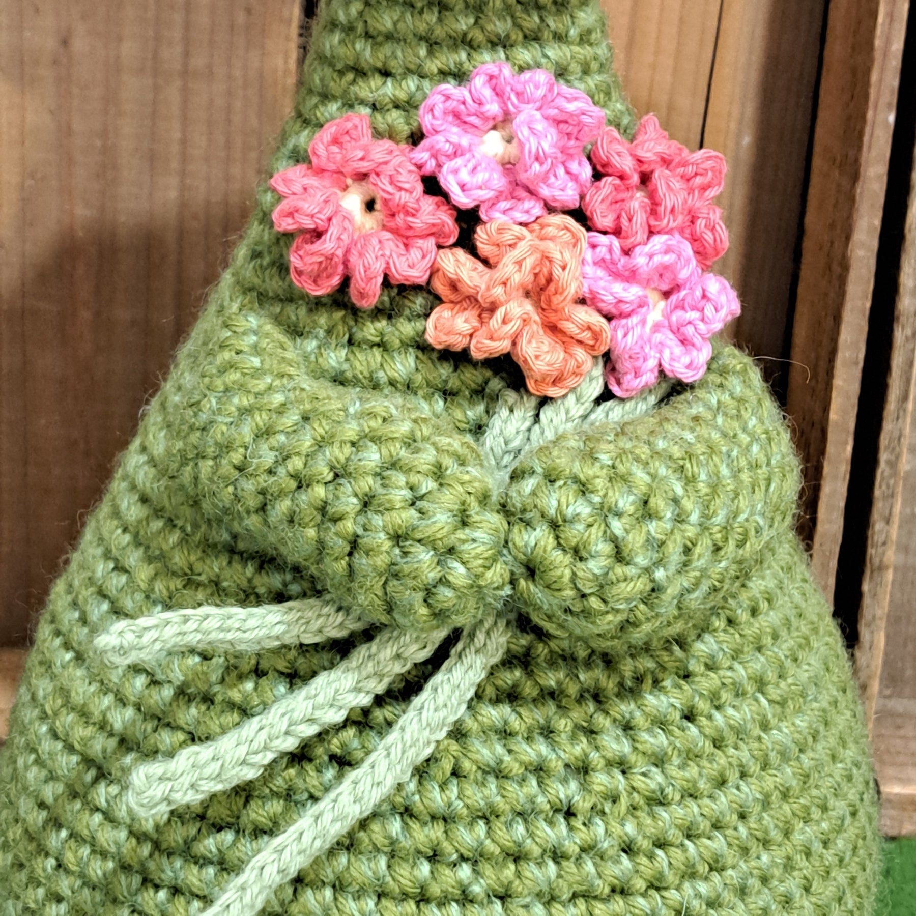 Handmade Highland cow crochet character doorstop in green
