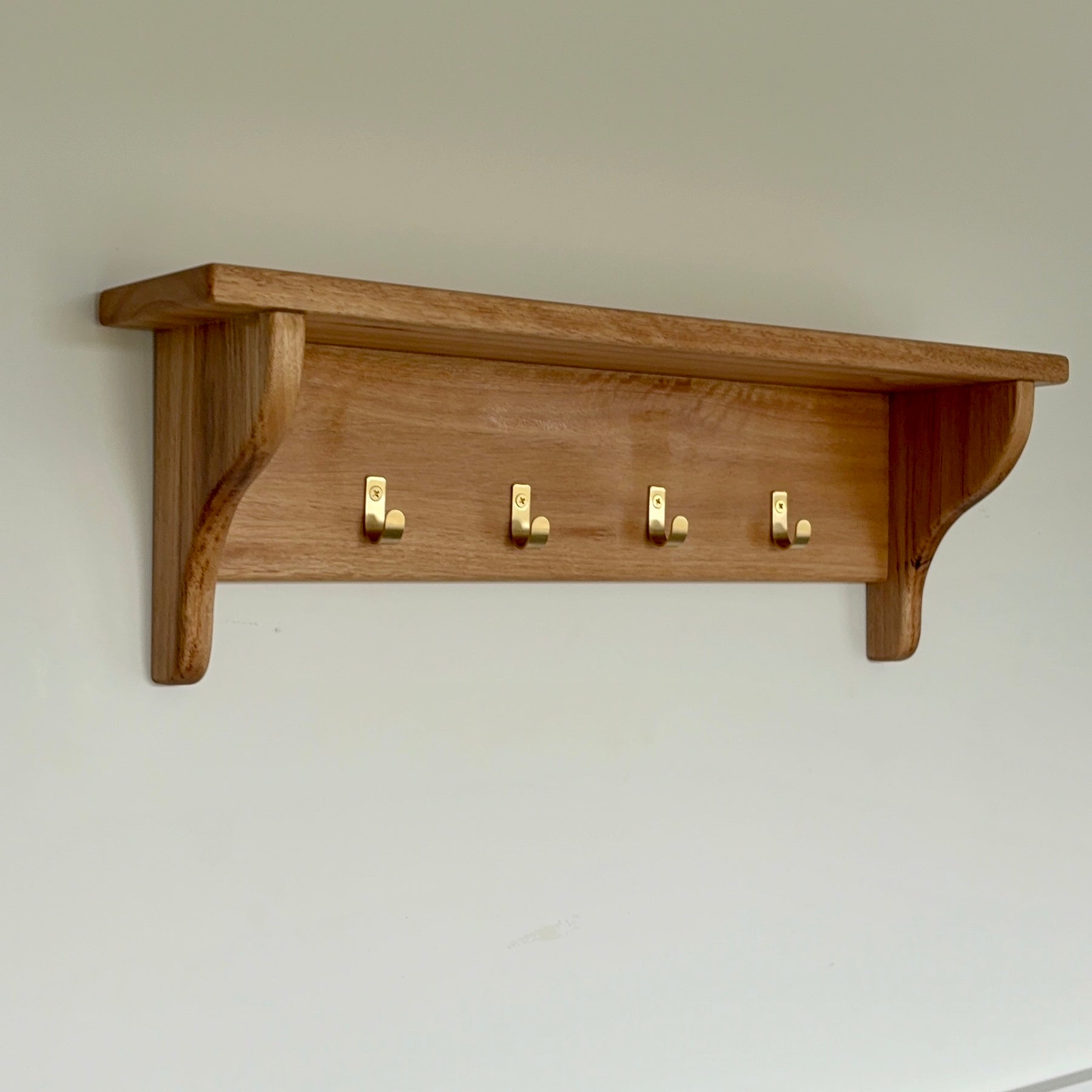 Blackbutt wall shelf with gold hooks