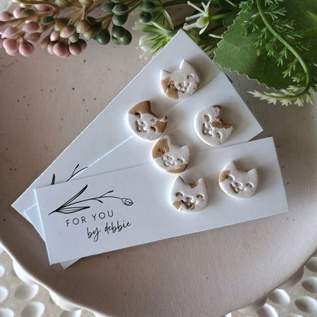 Happy cat stud earrings- white and brown